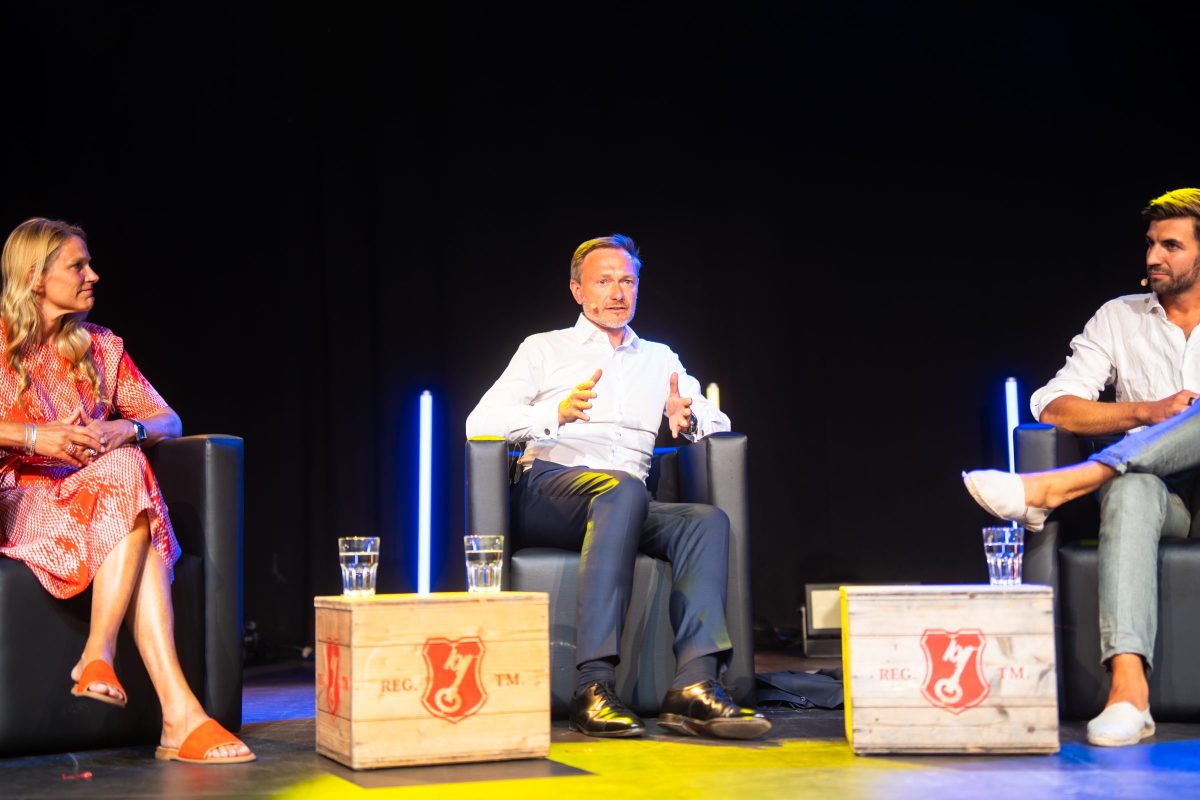 Christian Lindner, Svenja Lassen und Hanno Rener uaf dem Munich Startup Festival